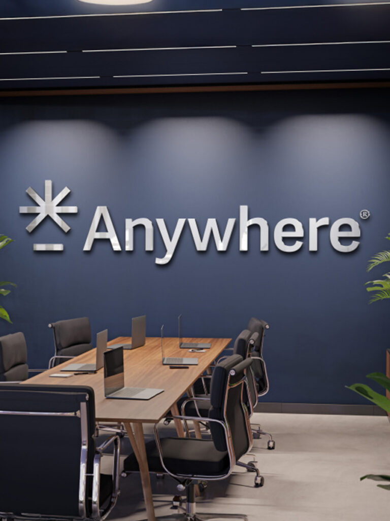 corporate office with the word and logo for Anywhere on the wall